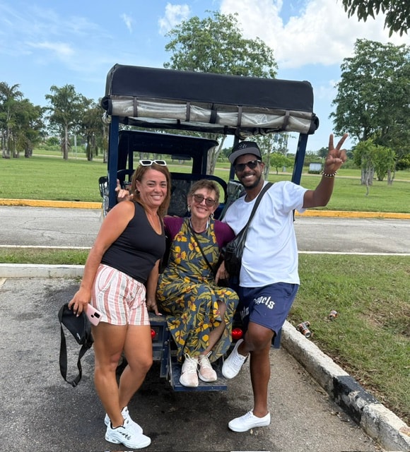 Chiara and hosts Pablito and Flavia on a taxi electrico